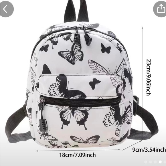 2 very cute back packs. Size is on the black and white one - Picture 2 of 2